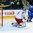 GRAND FORKS, NORTH DAKOTA - APRIL 19: The puck gets past Russia's Danil Tarasov #1 for a Sweden second period goal while Sweden's Elias Pettersson #21 looks on during preliminary round action at the 2016 IIHF Ice Hockey U18 World Championship. (Photo by Matt Zambonin/HHOF-IIHF Images)

